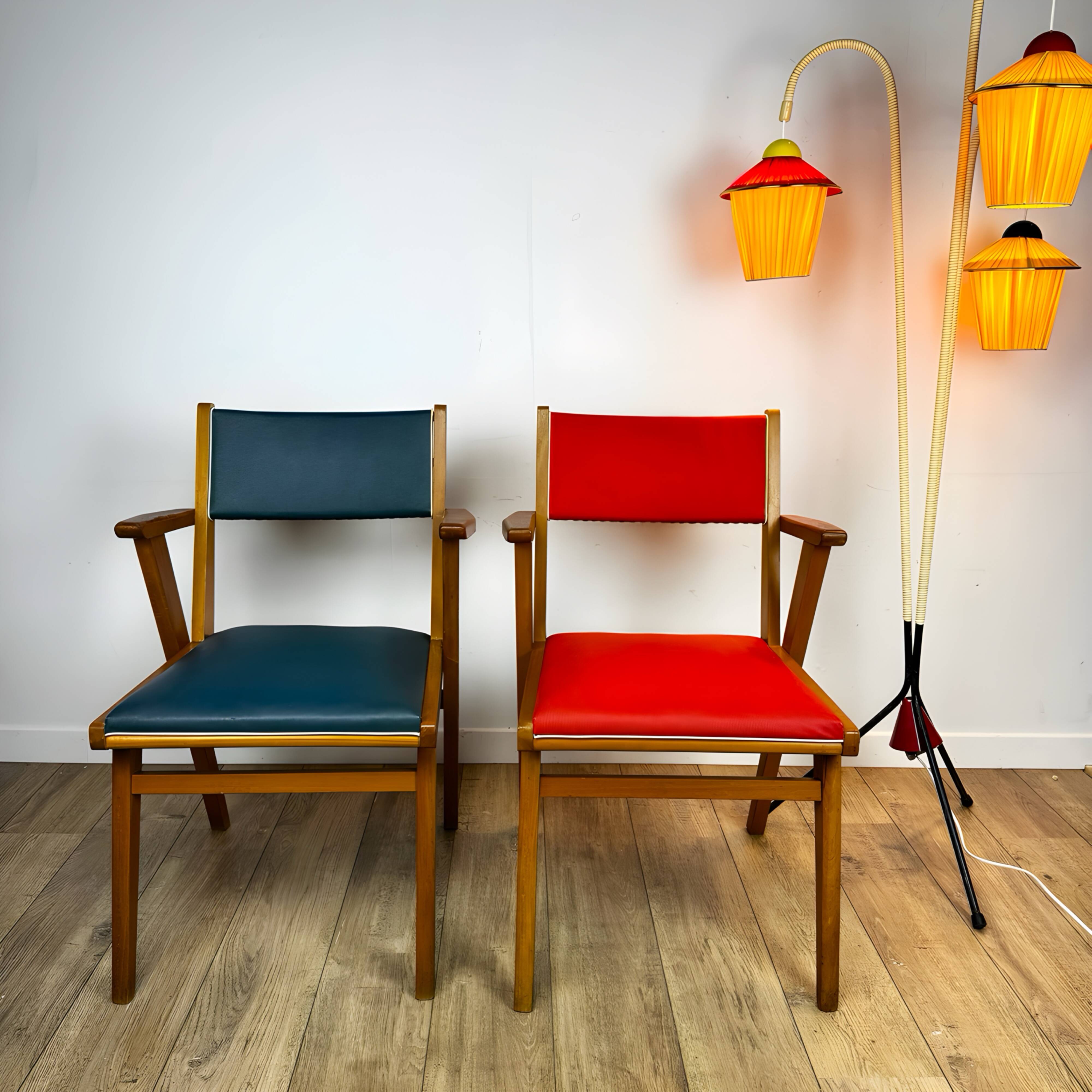 Pair of Scandinavian bridge armchairs in wood and vinyl from the 1950s.