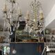 Small antique chandelier with tassels and bronze from the early 20th century