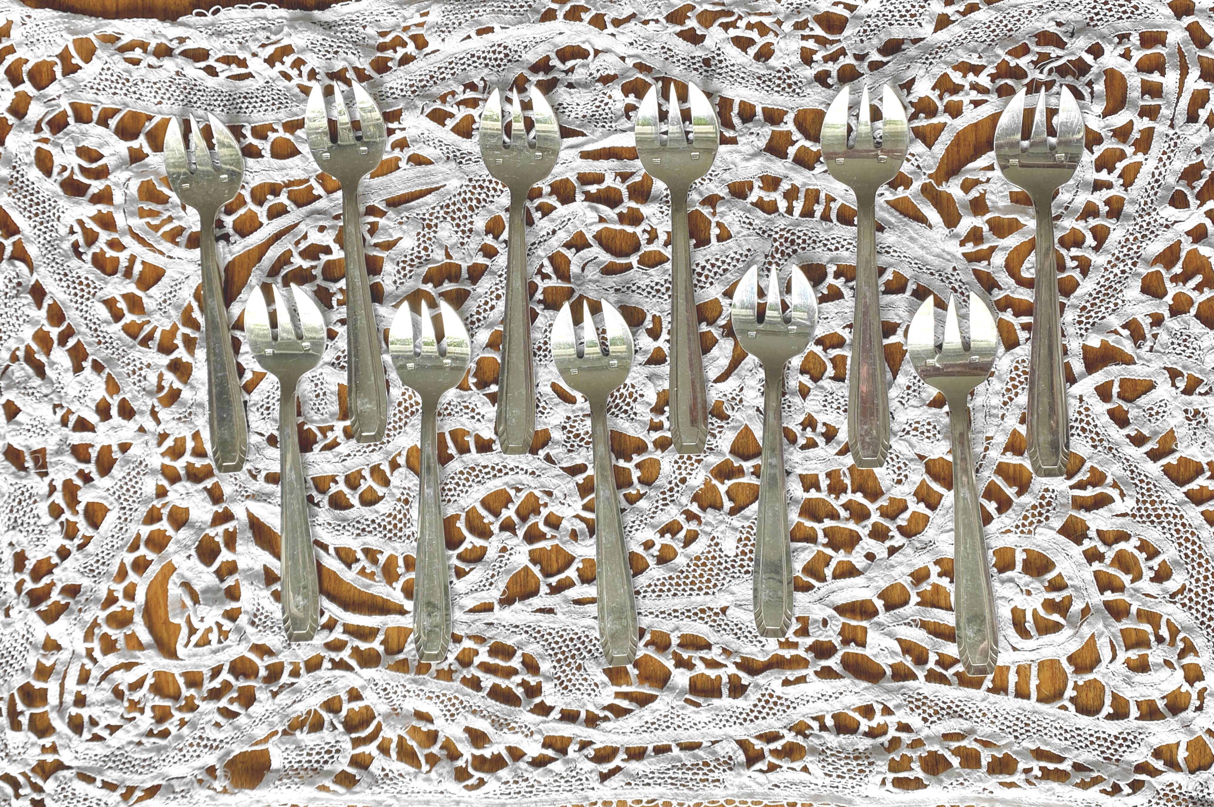 12 silver-plated oyster or dessert forks, Art Deco model