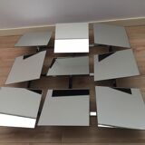 Scandinavian mirror has 9 removable panels by Markus Borgen