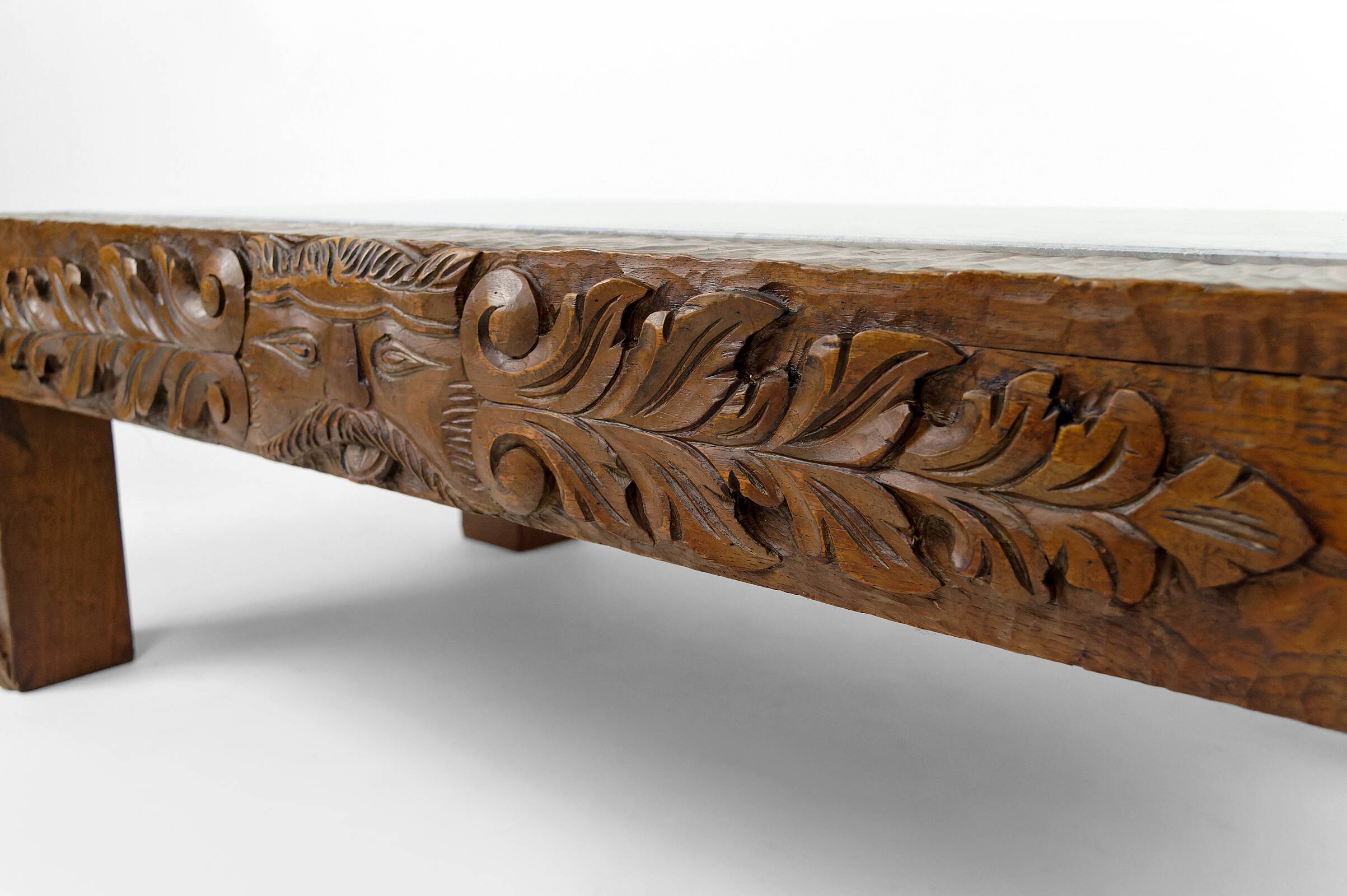 Solid oak coffee table carved with fauns and gray marble top, France, circa 1940