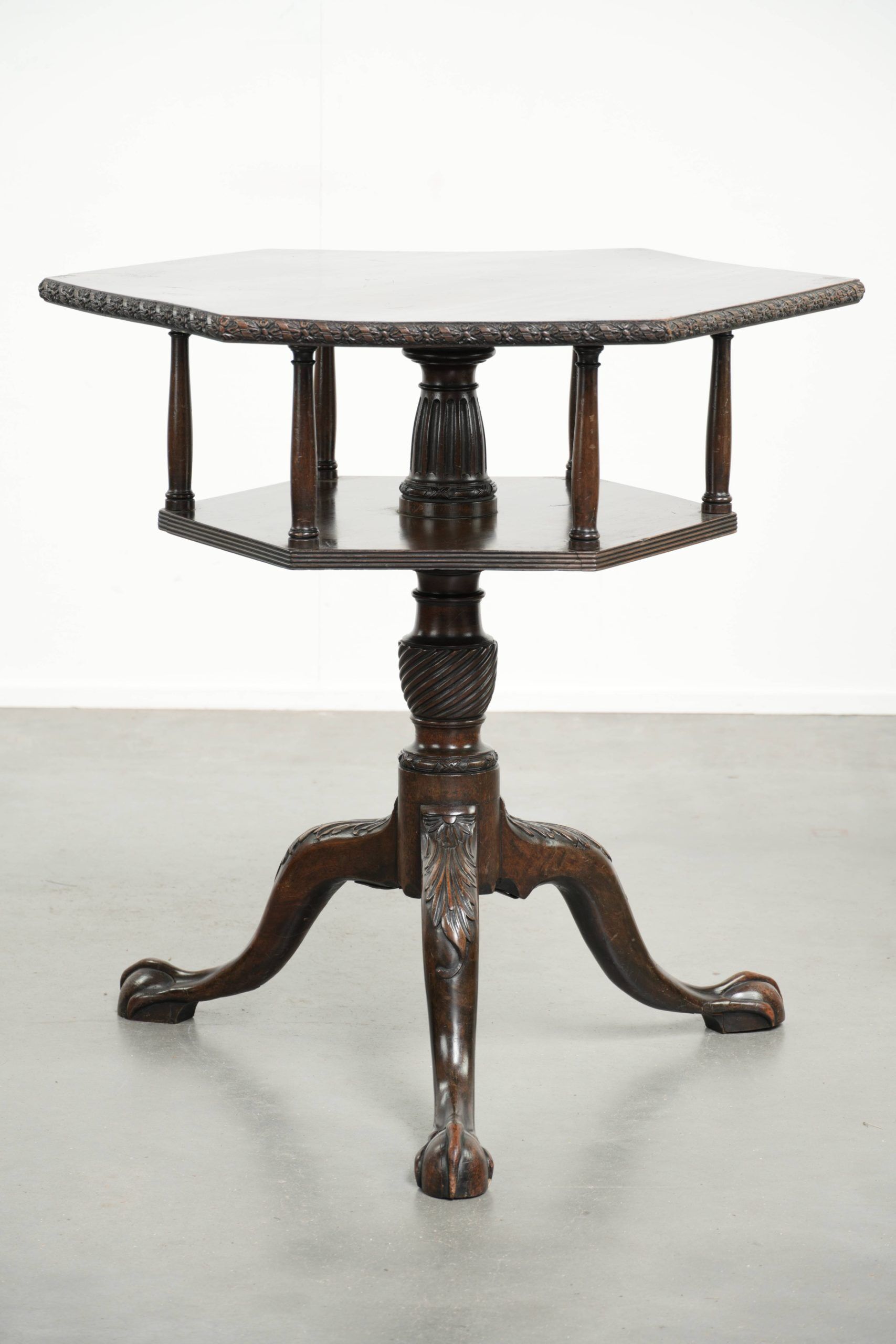 Antique wooden English rotating book table/side table from the 19th century