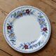 Vintage Gien earthenware flat plate with floral pattern on the border