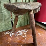 Old brutalist design wooden tripod stool