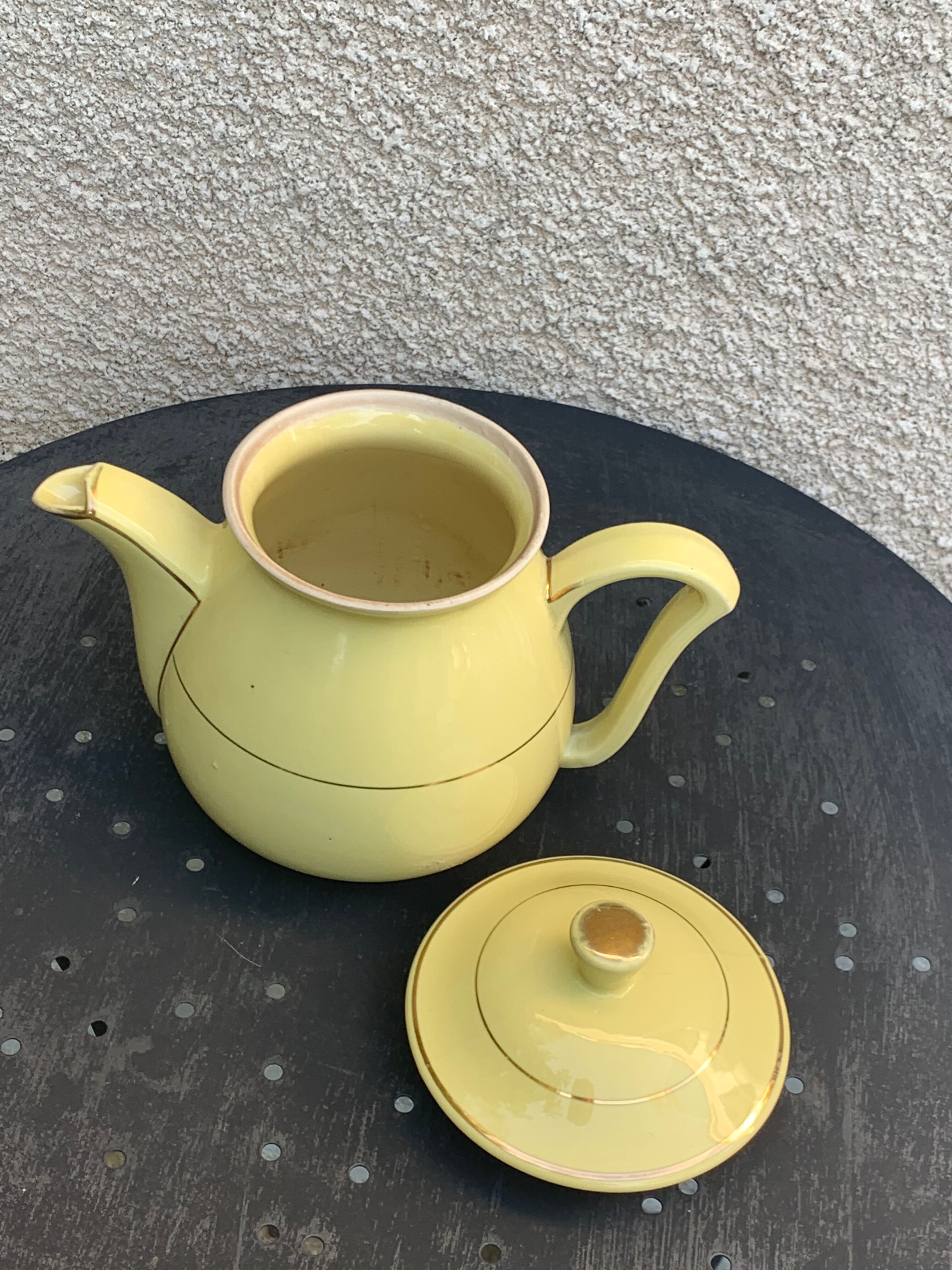 Teapot, yellow earthenware coffee maker and vintage gold edging