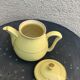 Teapot, yellow earthenware coffee maker and vintage gold edging