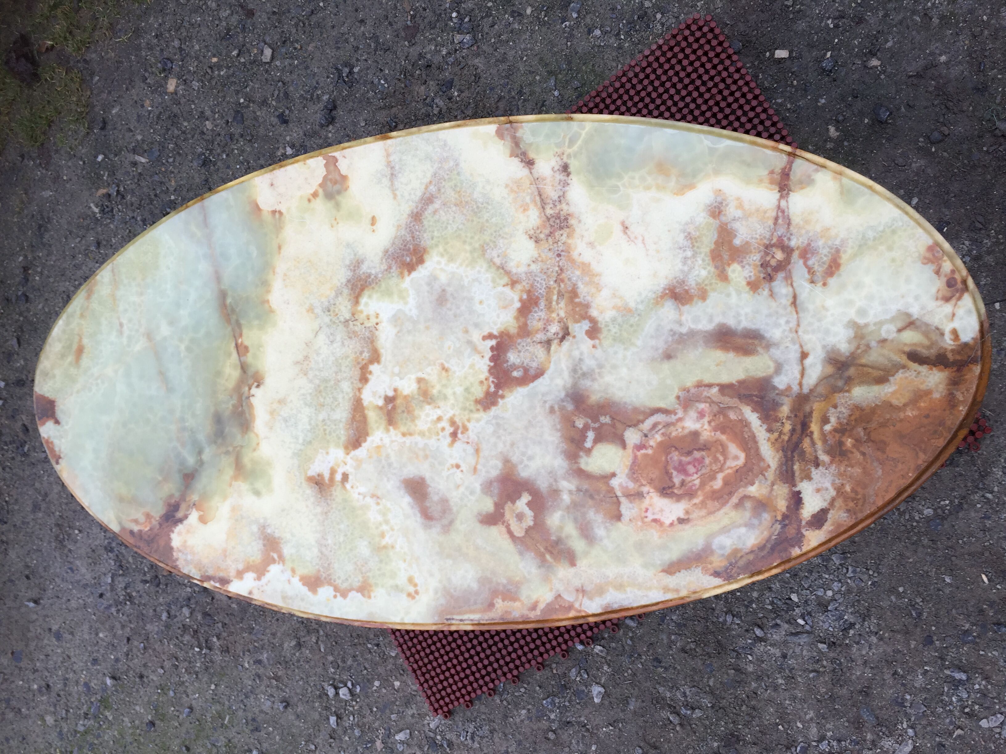 Vintage brass coffee table and oval alabaster top.
