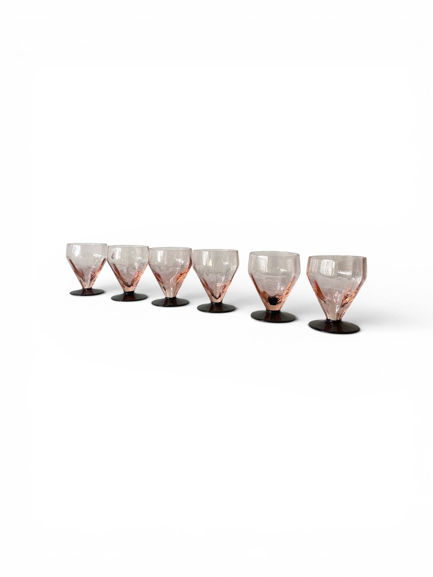 6 Art Deco pink wine or water glasses with black stems.