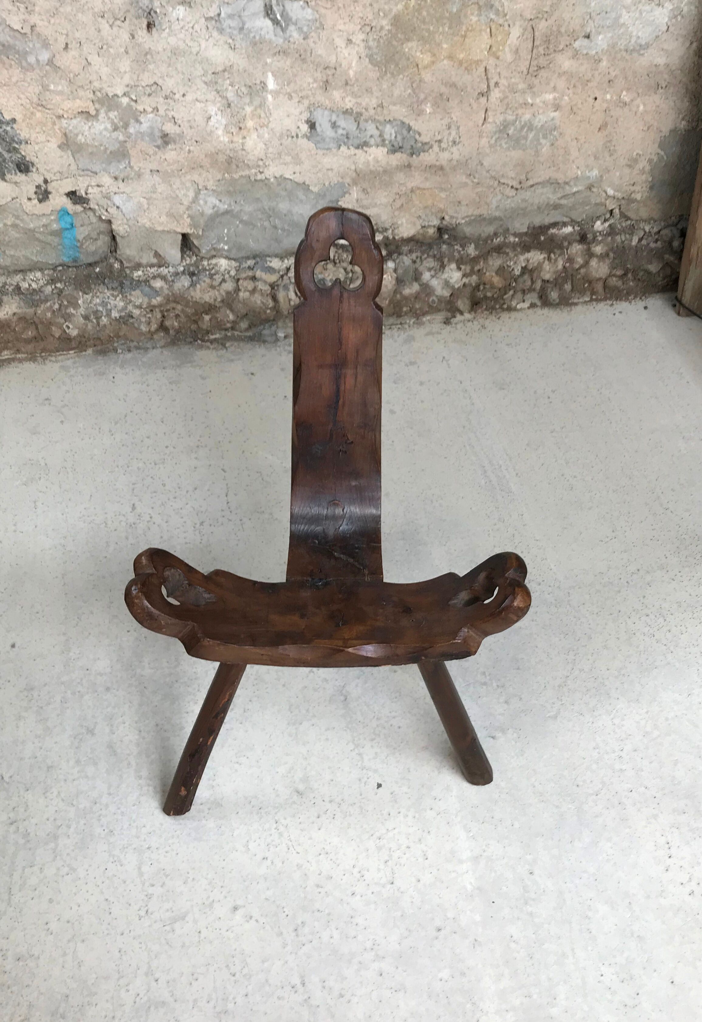 Tripod mountain chair carved wood brutalist 50s design