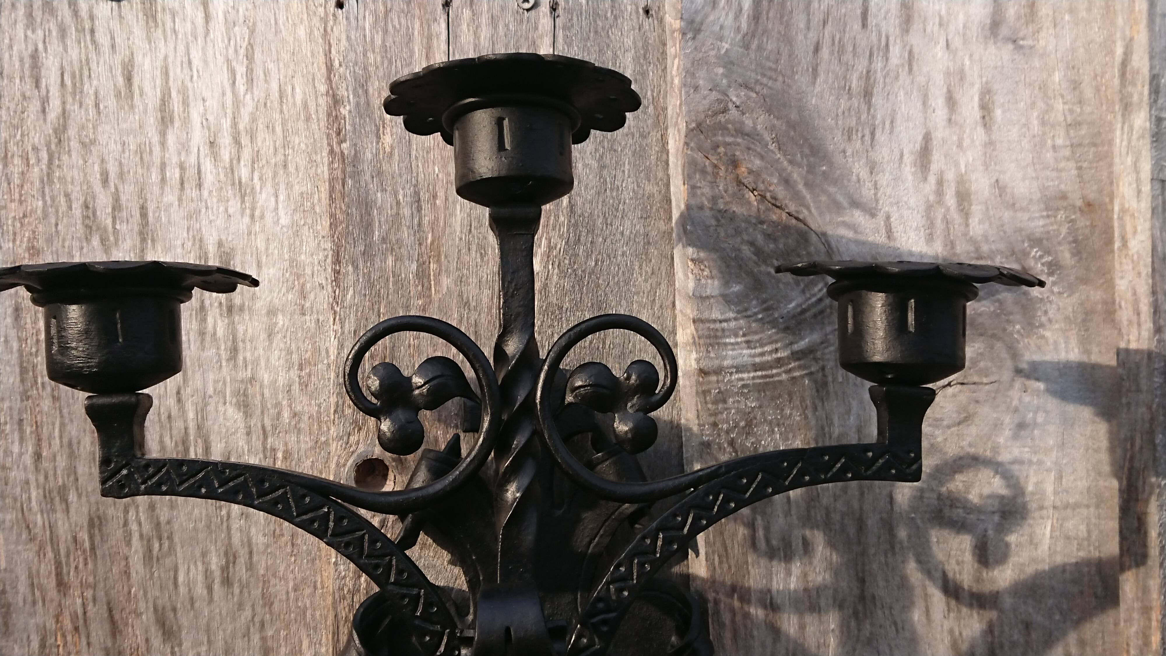 Pair of black wrought iron sconces - neo-Gothic style - from the 1950s