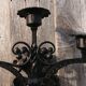 Pair of black wrought iron wall sconces - neo-Gothic style - from the 1950s