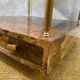 Aldo Tura side table in hazel brown tones with brass legs and bottom drawer