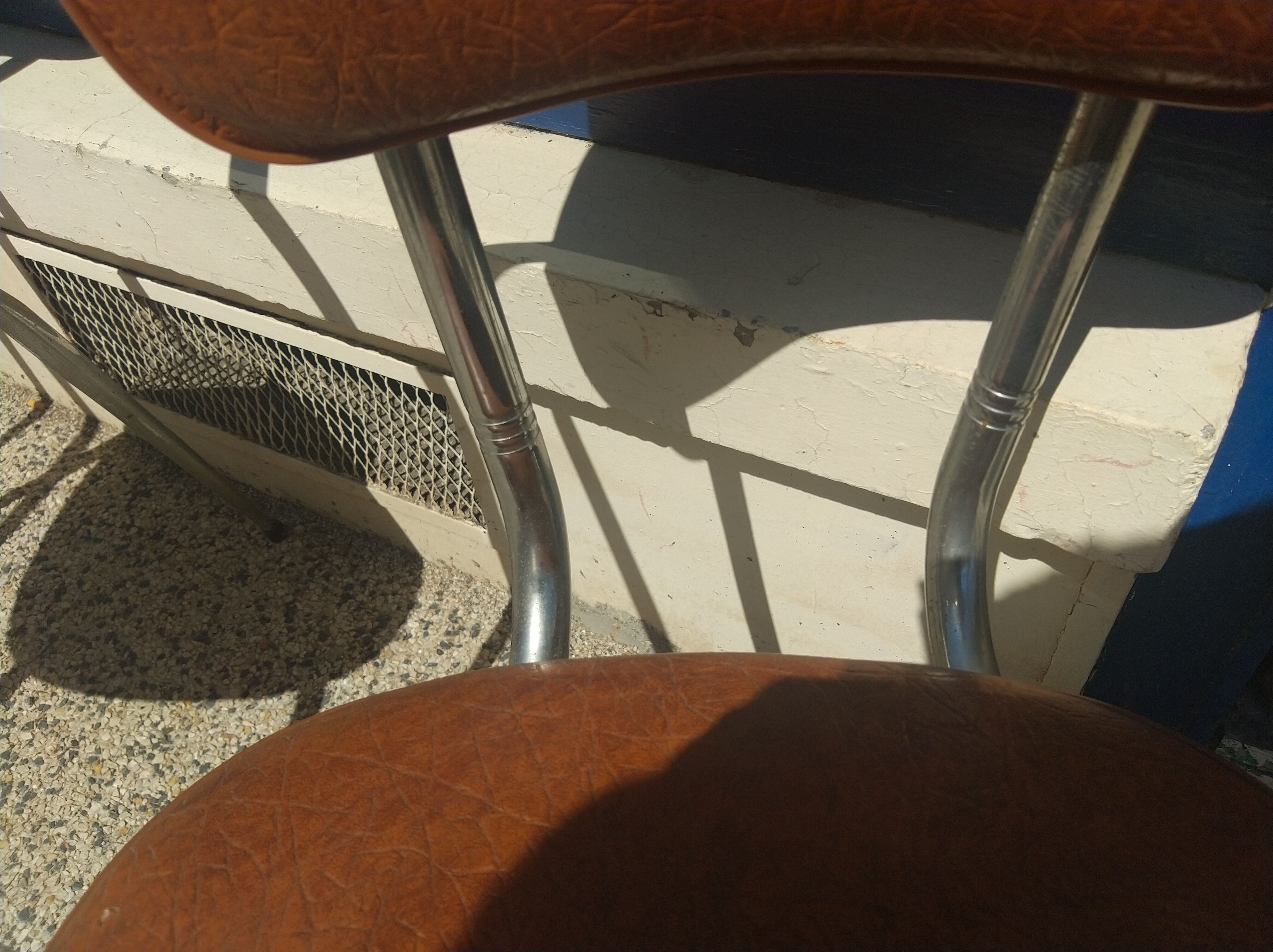 Set of 4 armchairs in chromed metal and brown imitation leather, circa 1960