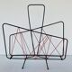Vintage black metal magazine rack circa 19