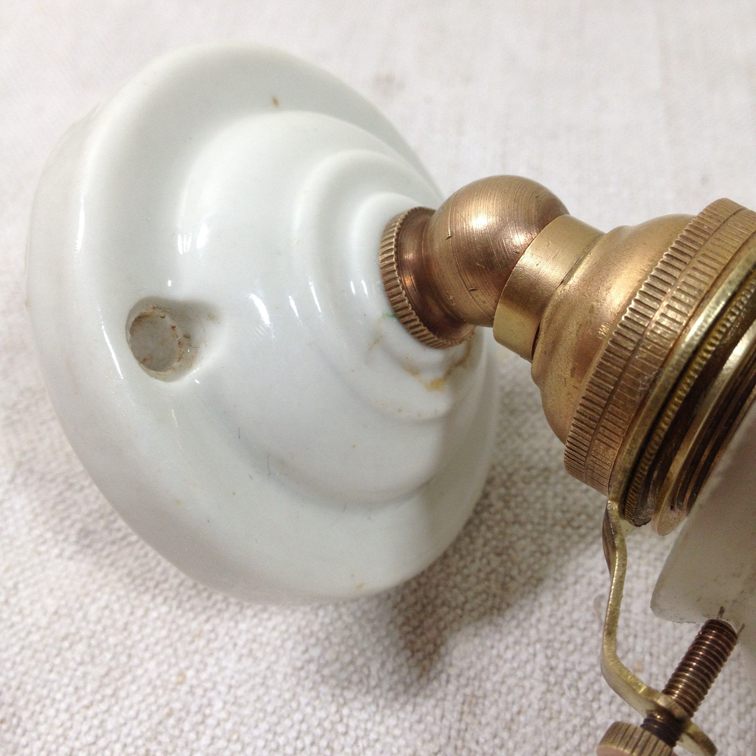 Art deco porcelain, brass and rose glass wall lamp