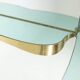 Two-tone glass console mirror with gilded brass. Circa 1950.