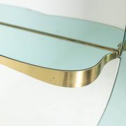 Two-tone glass console mirror with gilded brass. Circa 1950.