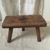 Crude wooden tripod stool