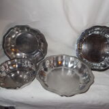 Lot of 4 round hollow stainless steel dishes