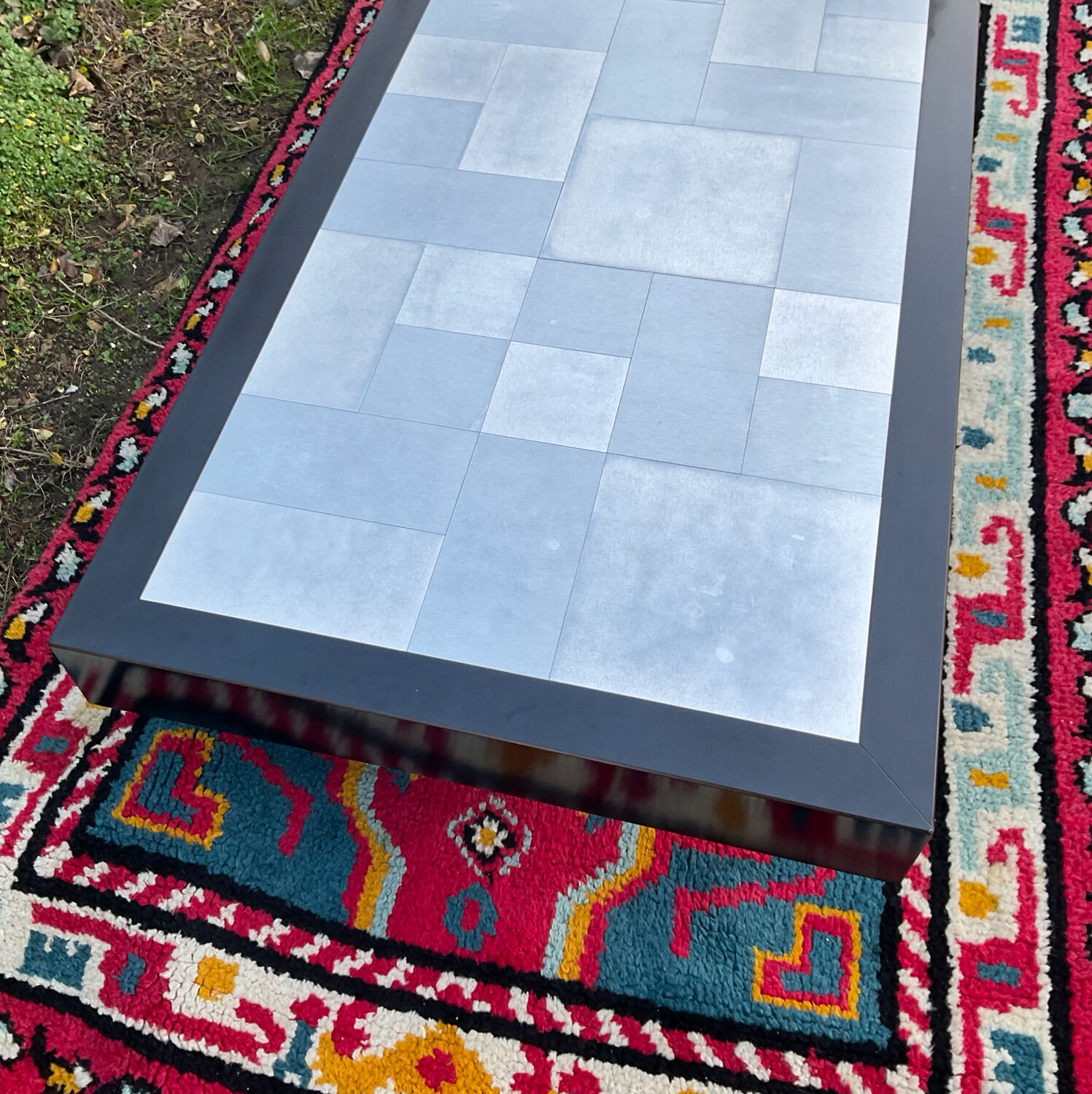 Vintage coffee table in stainless steel and black lacquered wood.