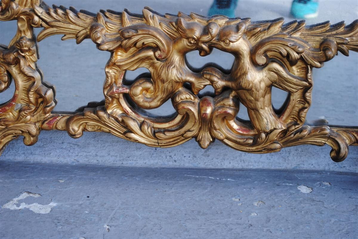 Mirror shield-close style Louis XV gold leaf gilding