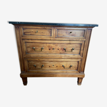 Old wooden order and black marble top