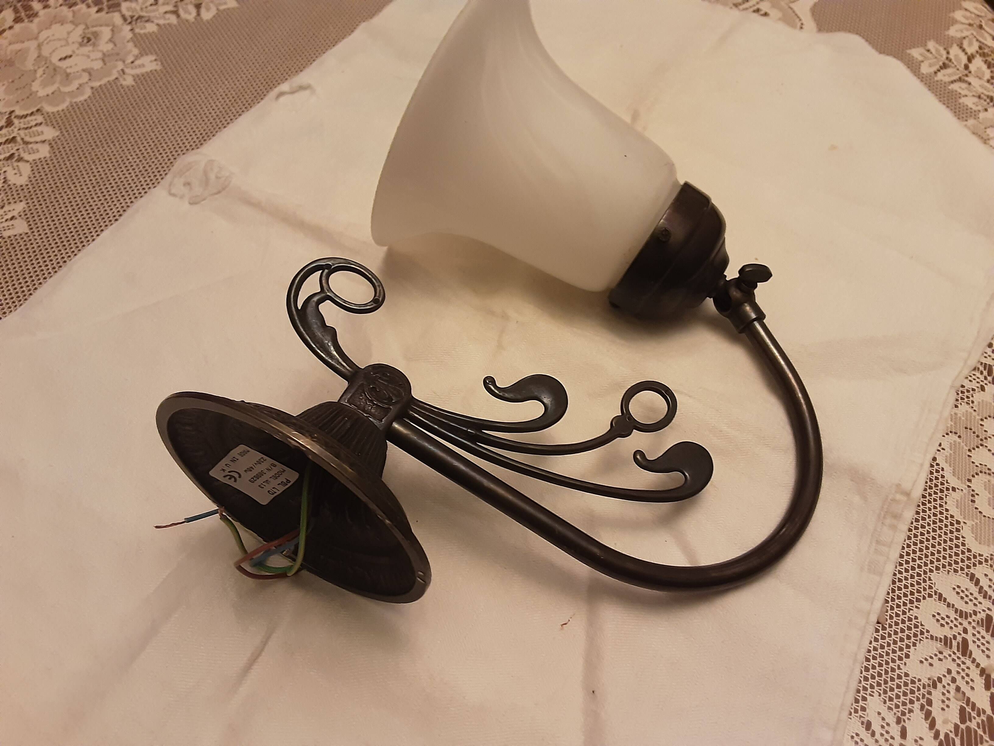 Glass wall light with iron frame