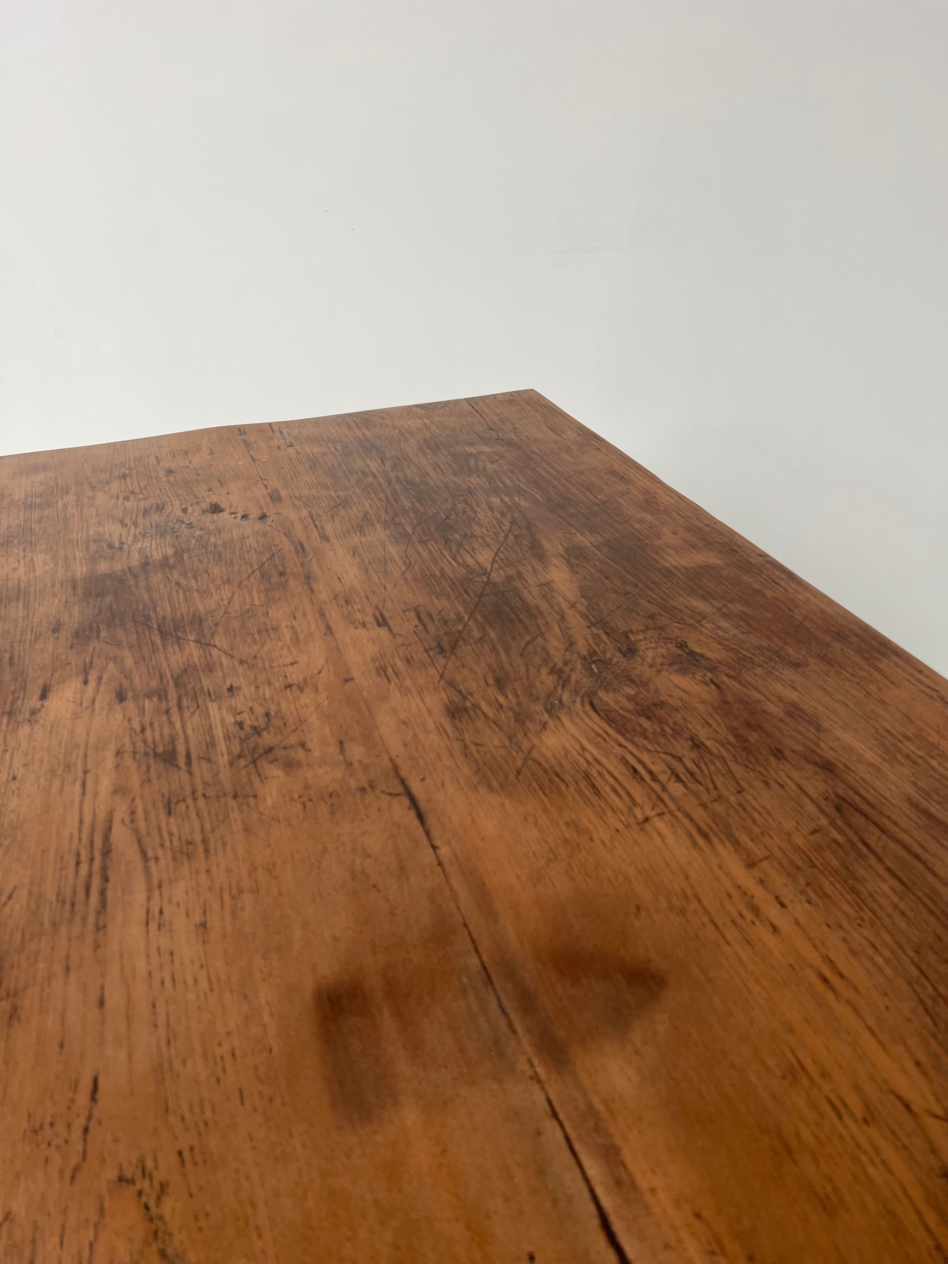 Teak dining table with spindle legs, 50s