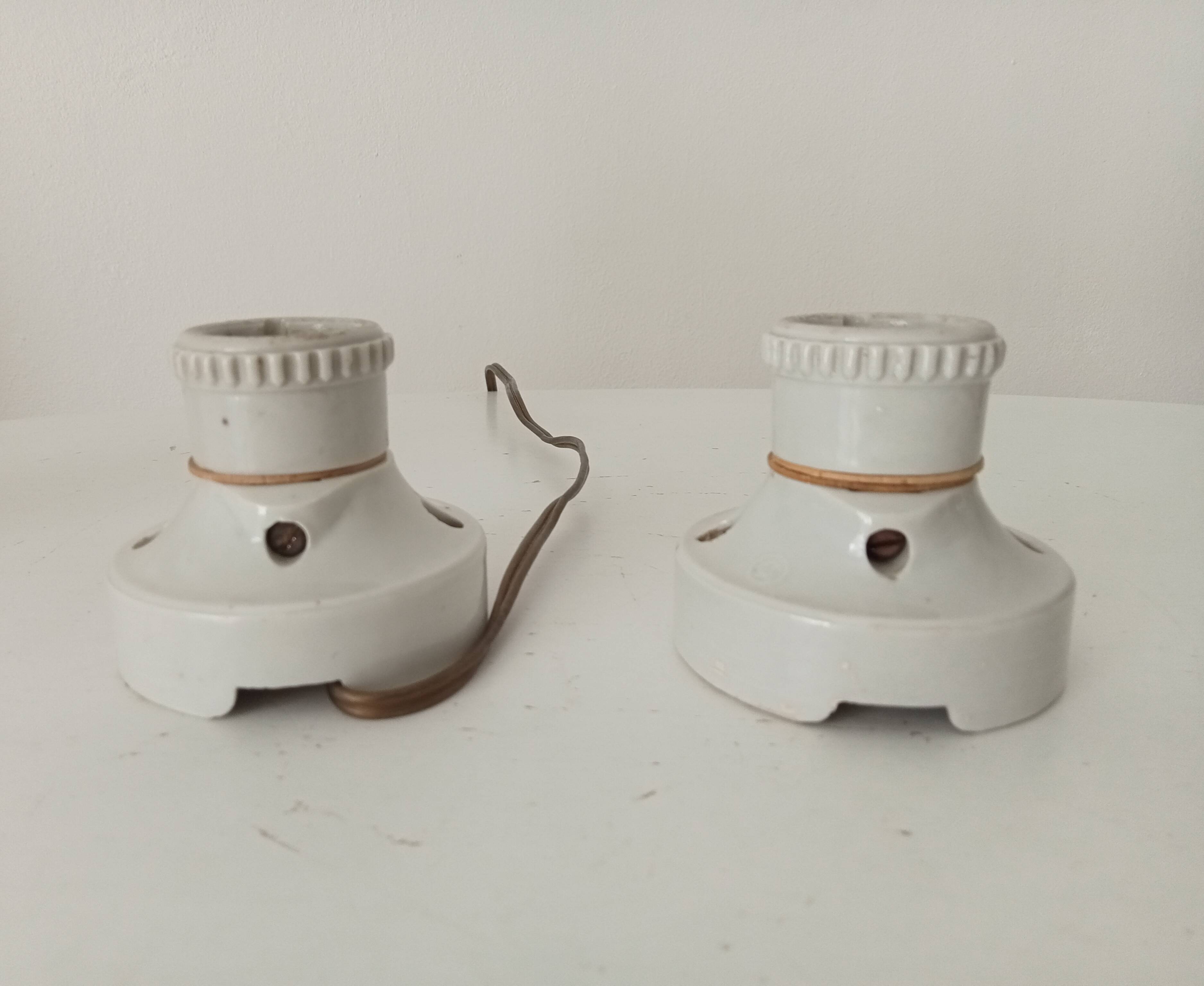 Pair of antique industrial porcelain wall lights