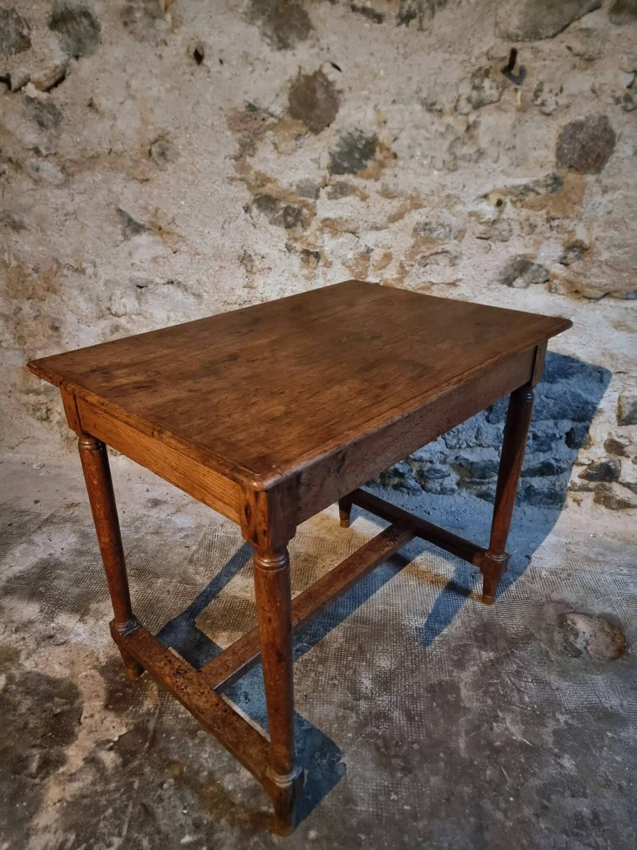 Antique French oak table, writing table from the early 19th century.