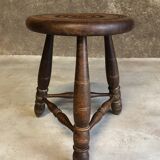 Tabouret tripode rond en bois foncé