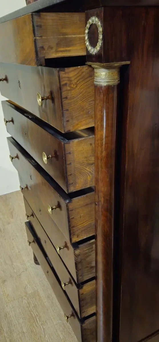 Empire period chest of drawers, early 19th century, in flame mahogany.