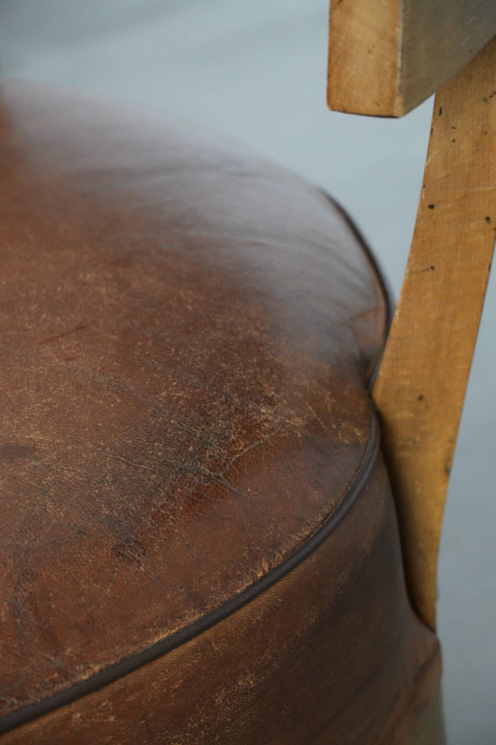 Set of 4 vintage design chairs made of sheepskin leather