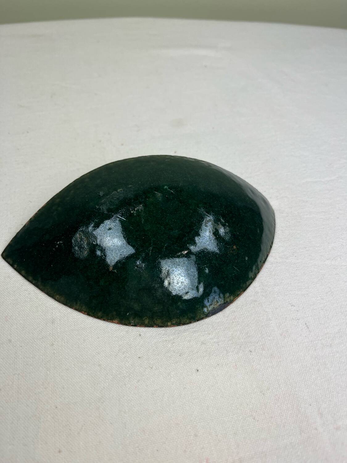 Enameled copper pocket emptier