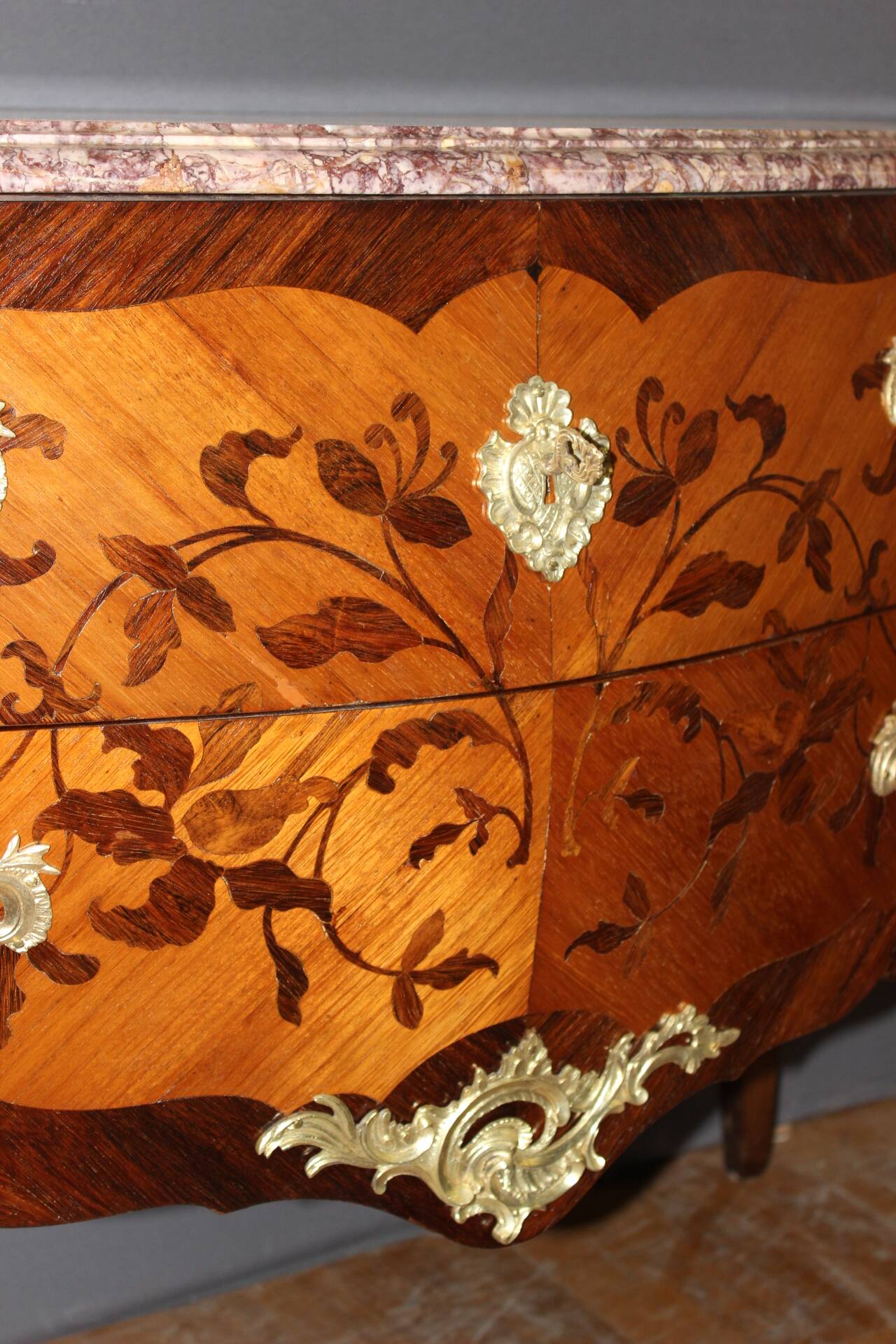 Louis XV style commode in marquetry from around 1930.