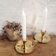 Pair of brass cellar rat candlesticks