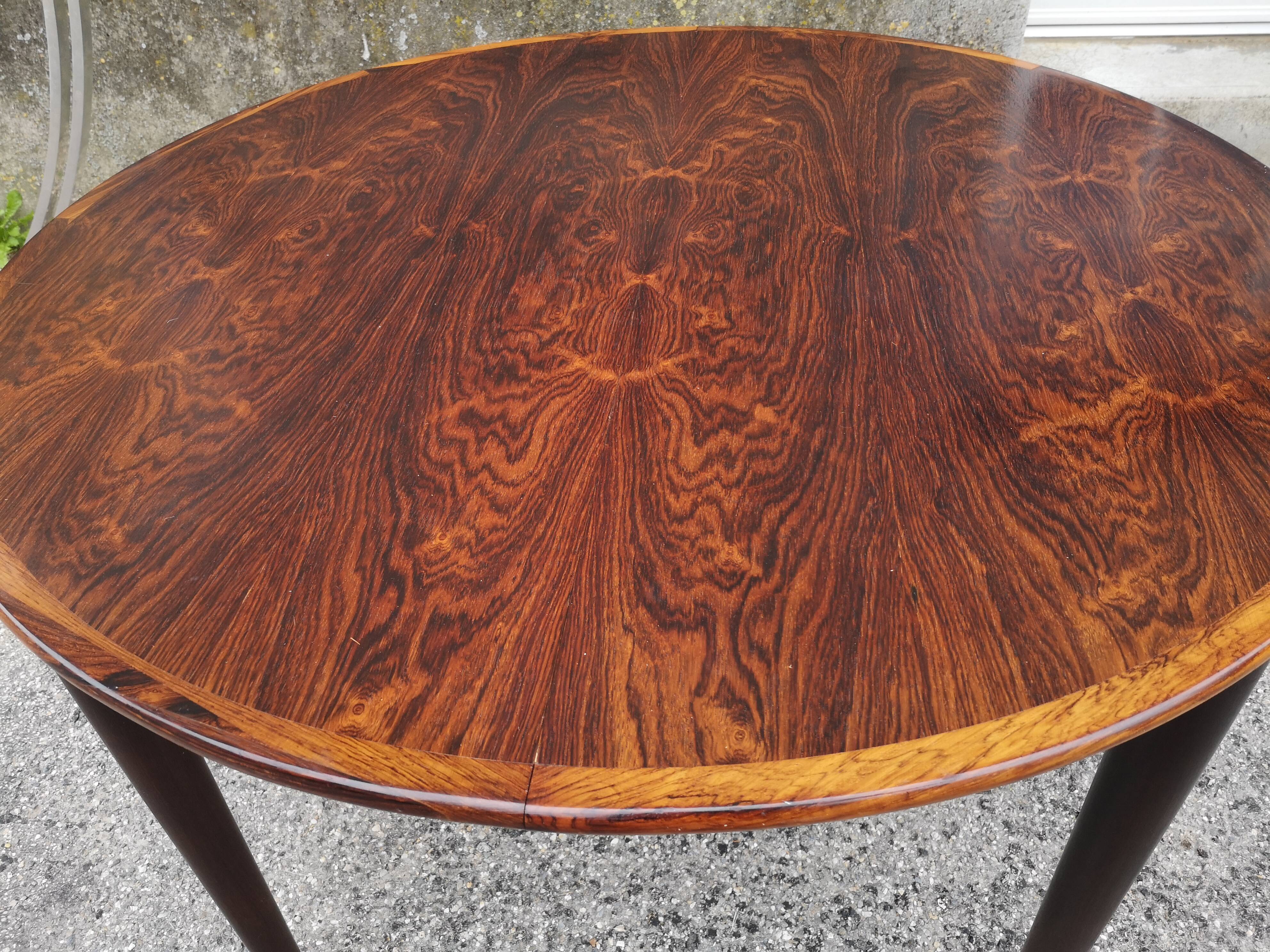 Extended rosewood round table