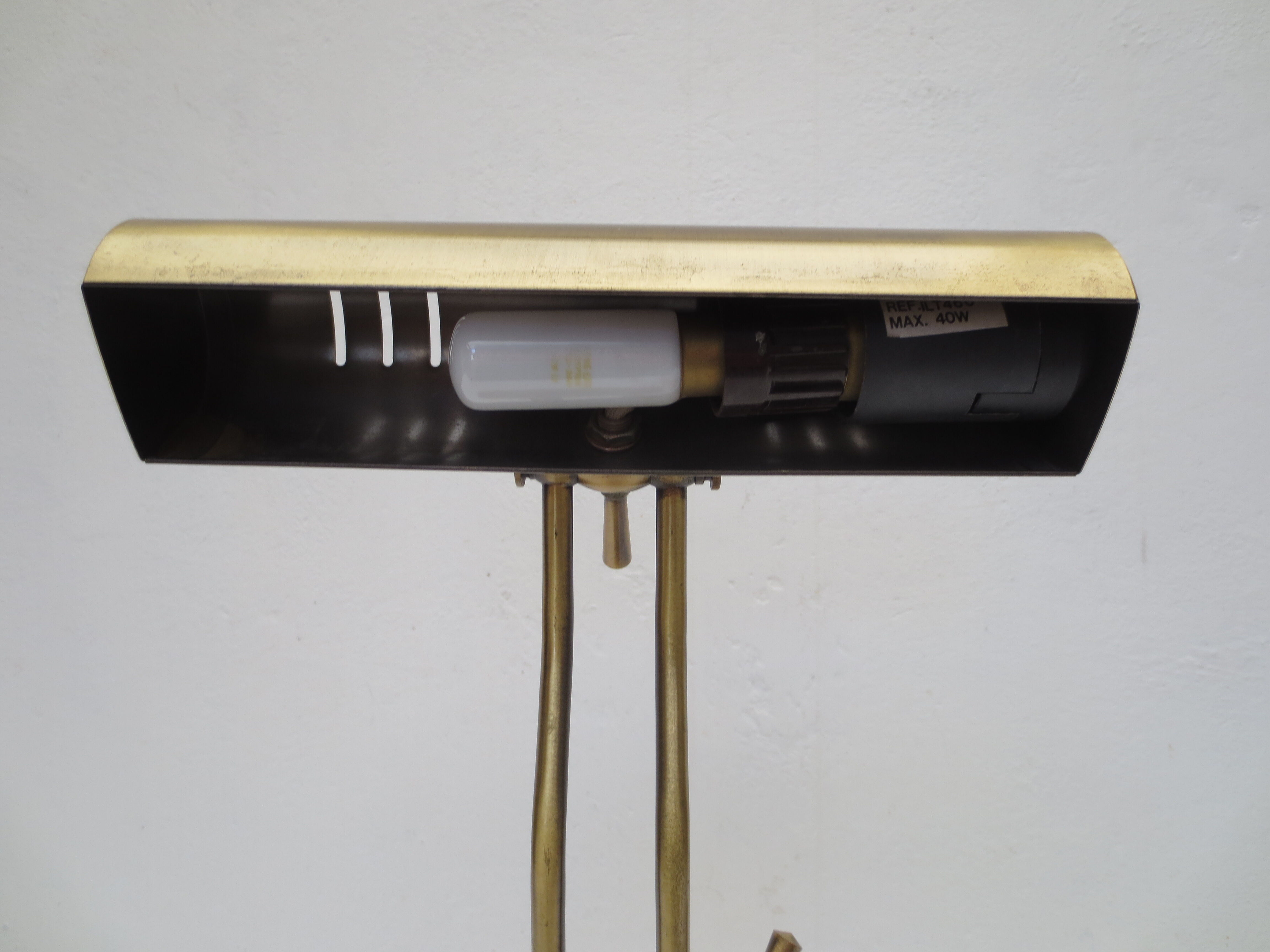 Old aged brass articulated desk lamp