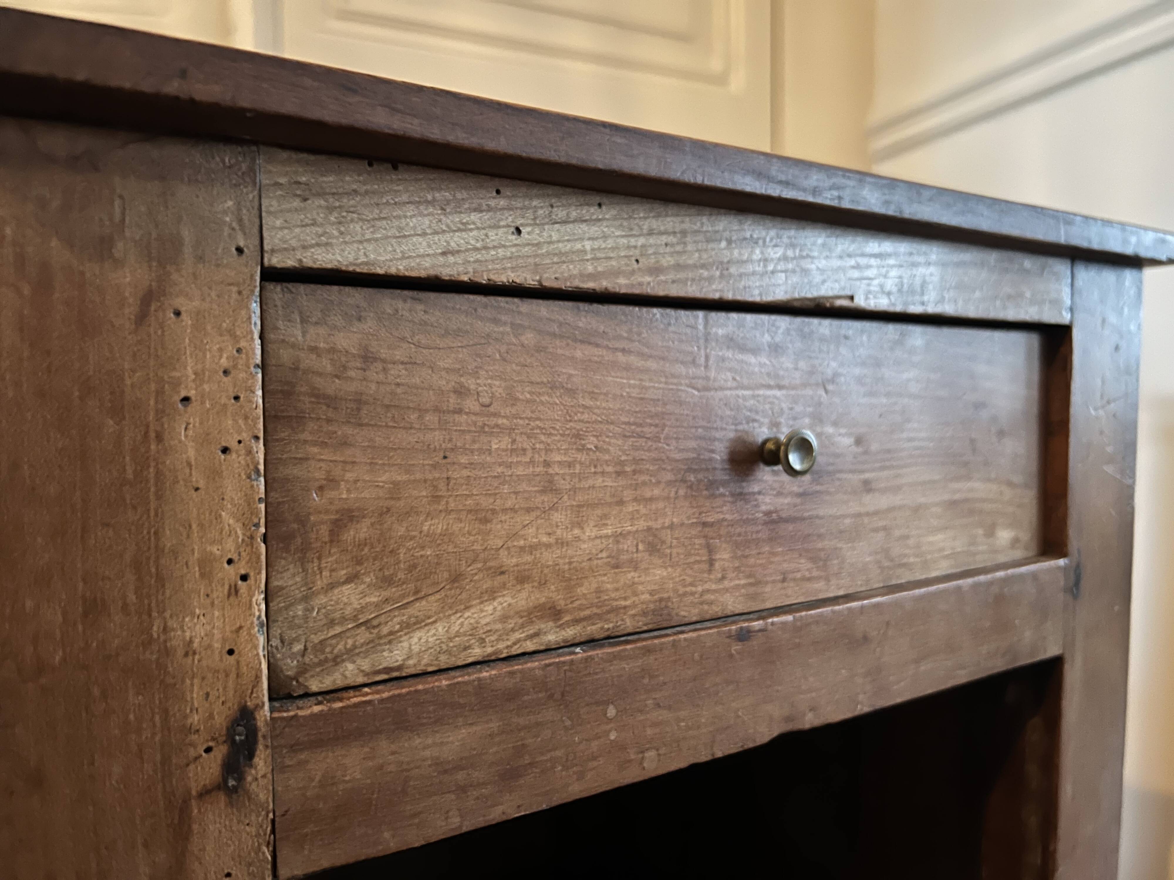 Old wooden bedside table
