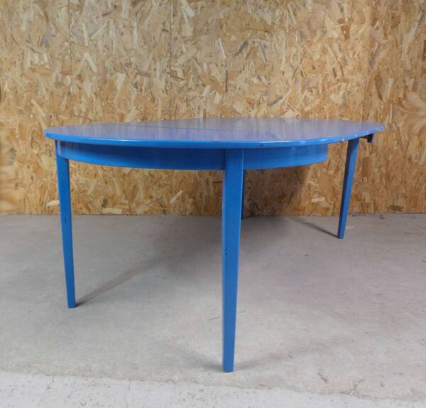 table ronde avec 4 chaises et 2 rallonges