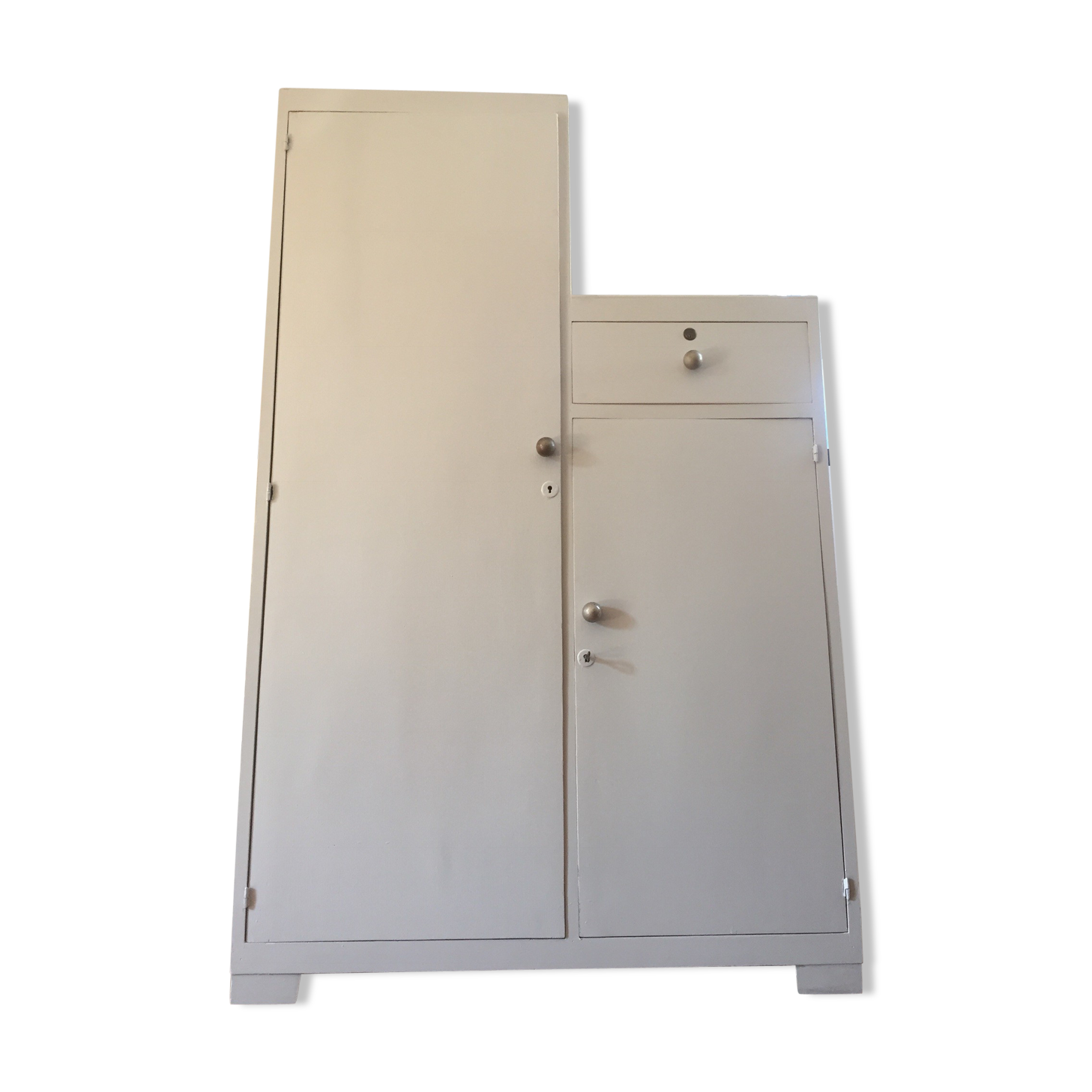 Asymmetrical cabinet 30's