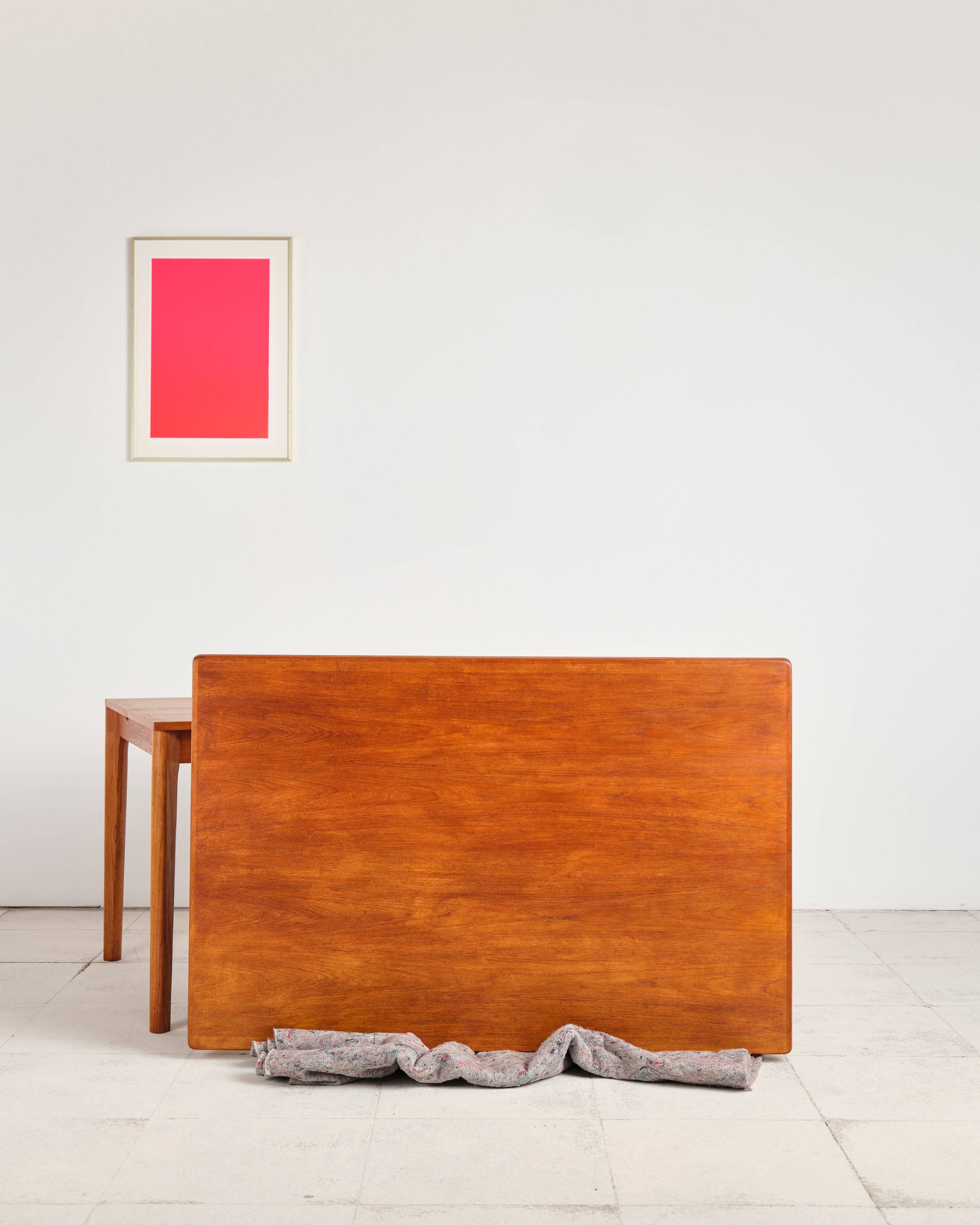Extendable table by Henning Kjærnulf for Vejle Stole, 1960s.