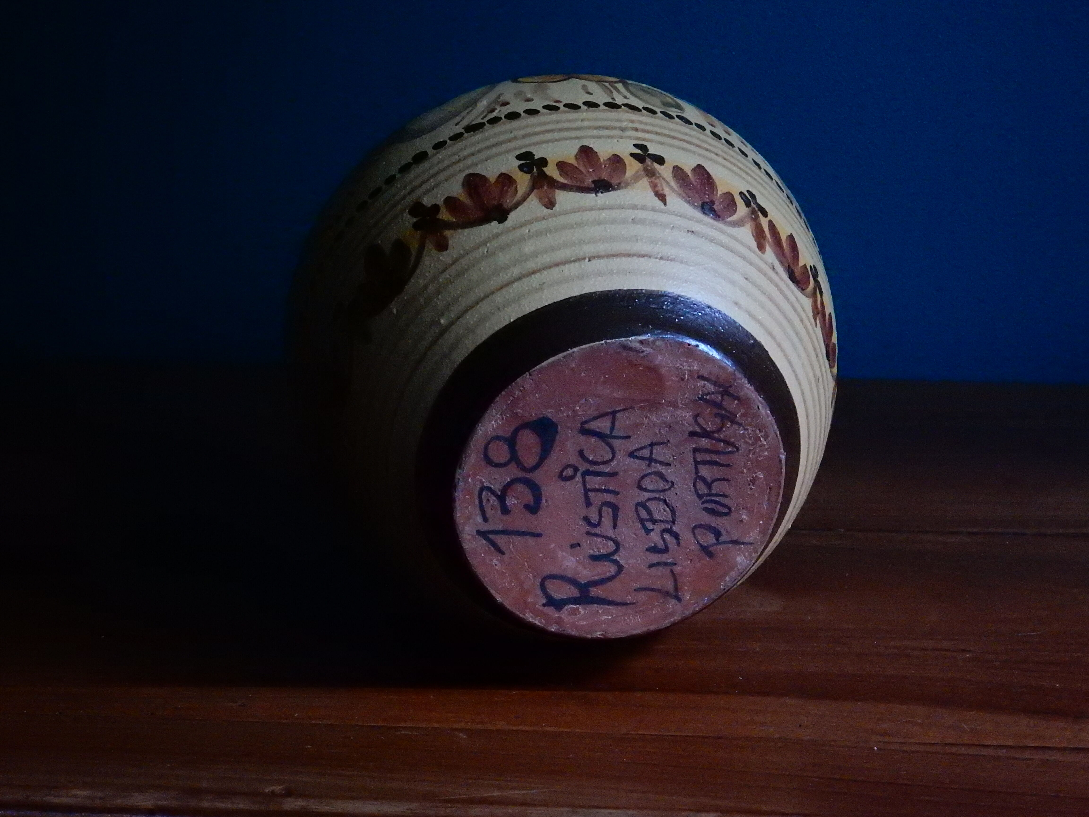 Hand-painted terracotta jug