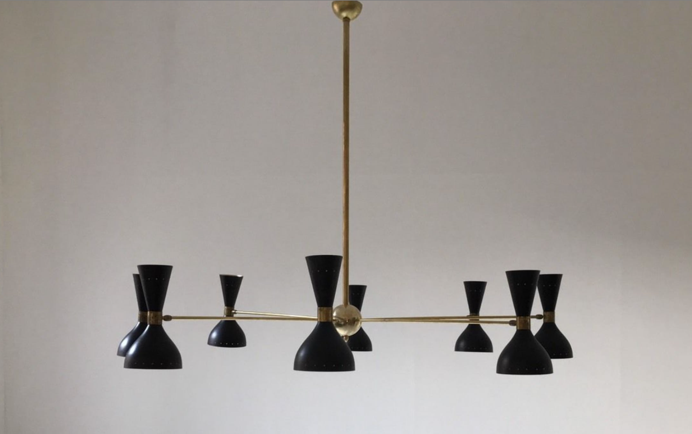 Brass chandelier and black lacquered metal