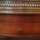 Oval hot water table in cherry and marble