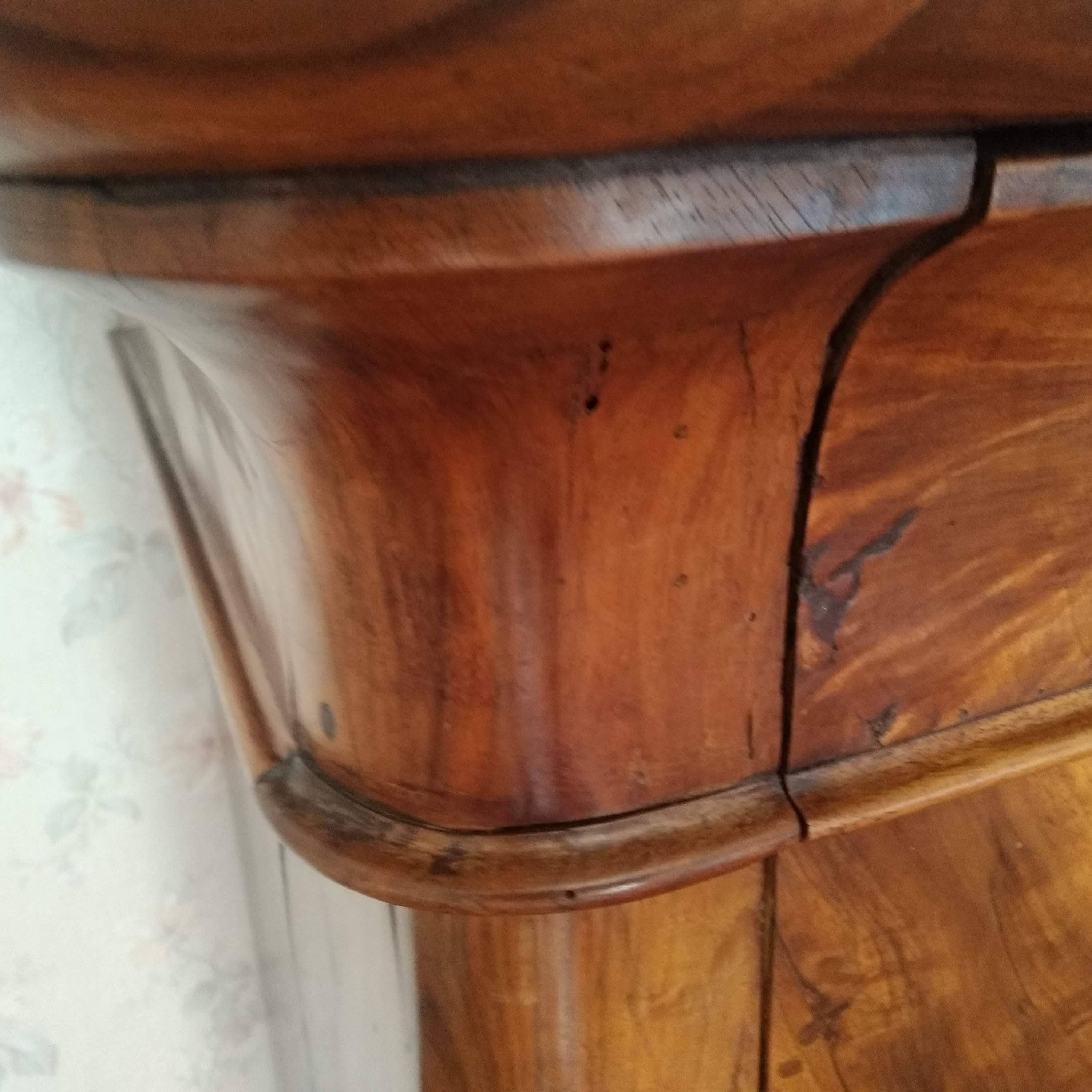 Antique Louis Philippe chest of drawers with lion paws