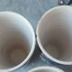 X5 enamelled ceramic mugs with abstract 60s decor