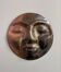 Sculpture face in embossed enamelled brass from the 1960s.