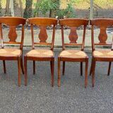 4 Landais chairs with solid oak cross frames, straw seats.