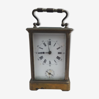 Pendulette d'officier sct flarum bronze et verre bisauté